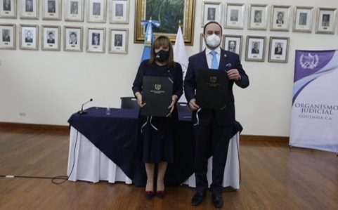 Firman de convenio de cooperación entre el OJ y Cancillería