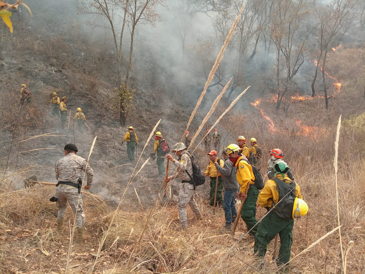 Conred trabaja en la liquidación de un incendio en Sacapulas, Quiché